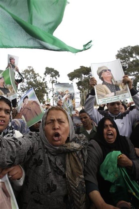 Libyan supporters of Moammar Gadhafi demonstrate Thursday outside a Tripoli, Libya, hotel where most of the foreign media representative are staying.